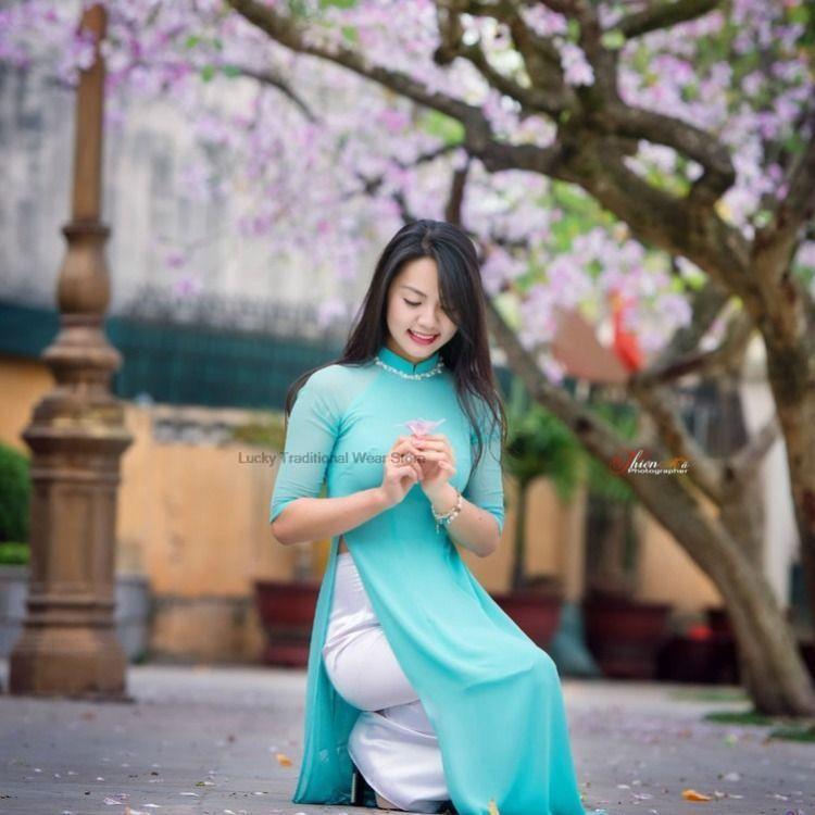 woman aodai vietnam traditional clothing ao dai vietnam robe and pants vietnam image 1