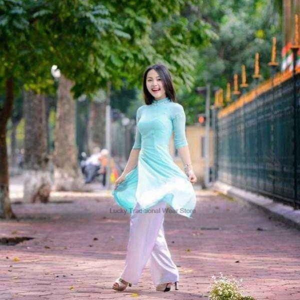 woman aodai vietnam traditional clothing ao dai vietnam robe and pants vietnam image 9