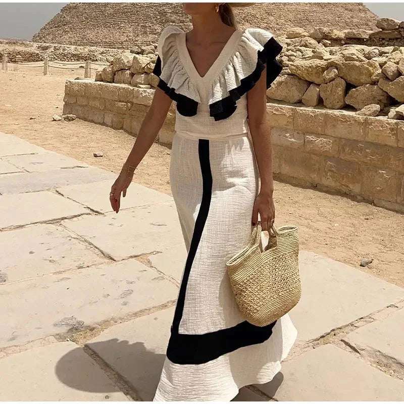 Ropa de mujer, verano 2025, nuevo estilo, moda europea y americana, conjunto informal de media falda con escote en V y volantes en colores contrastantes